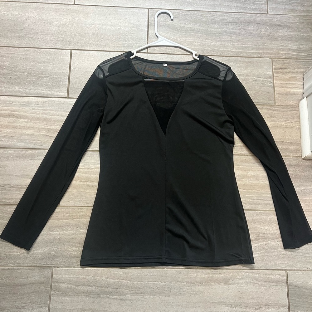 Mesh sleeves & top of the back + front